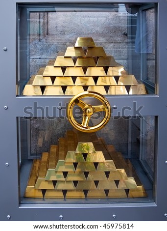Bank vault with stack of gold bars in Geneva, Switzerland