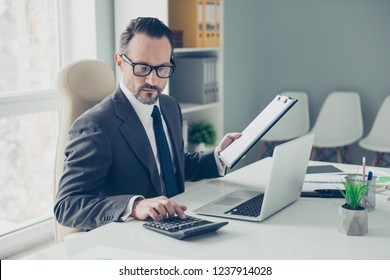 Banker Broker Man In Formal Wear Sit On Chair Armchair Behind Desktop With Modern Technology In Bright Lite Workplace Office Keeps Economic Records