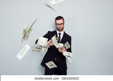 Banker increase profit lottery jackpot shower waste posh chic classy wealthy stack dealer dealing costly throw expensive concept. Proud arrogant tricky handsome guy sharing money isolated background