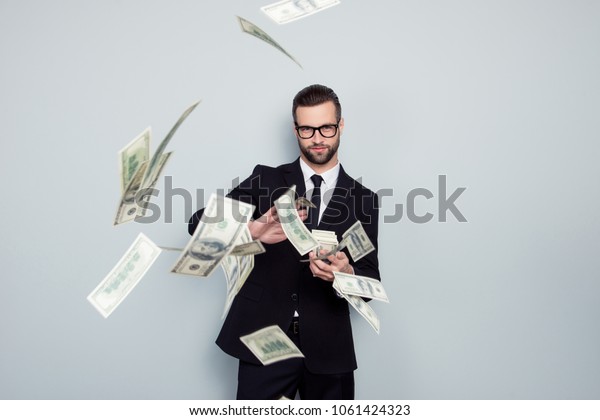 Banker increase profit lottery jackpot shower\
waste posh chic classy wealthy stack dealer dealing costly throw\
expensive concept. Proud arrogant tricky handsome guy sharing money\
isolated background