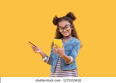 Banking Card. Happy Positive Girl Holding A Debit Card While Making A Payment