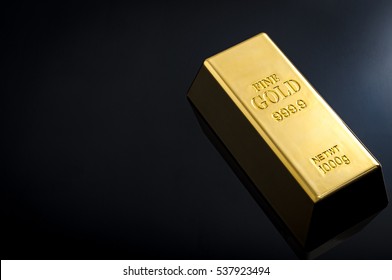 Banking And Financial Industry Concept With A Gold Bar And Copy Space. Although The Gold Standard Has Passed, A Declining US Dollar Means Rising Gold Prices