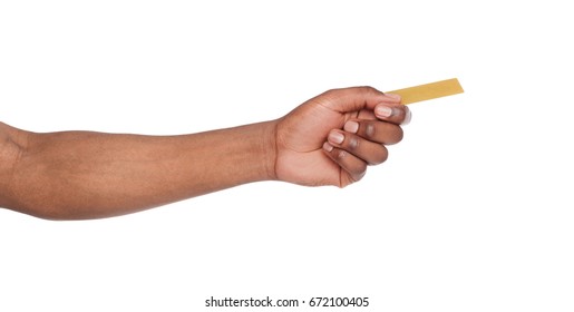 Banking Services. Black Male Hand Giving Plastic Credit Card On White Isolated Studio Background, Copy Space, Cutout