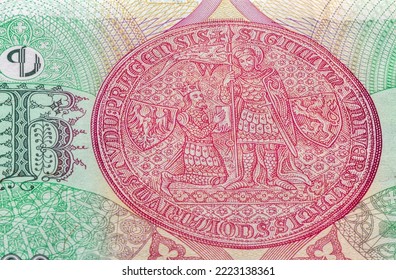 banknote of 100 Czech crowns reverse closeup with seal of Charles University macro