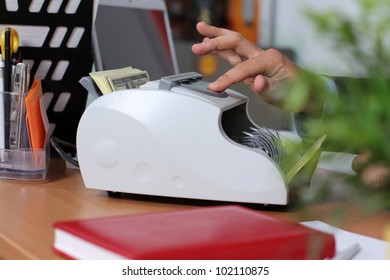 Banknote Counter And Dollars Banknotes