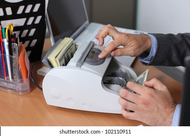 Banknote Counter And Dollars Banknotes