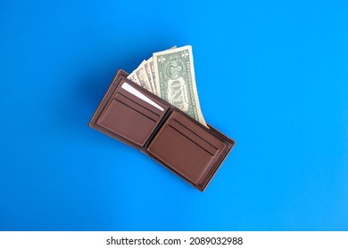 Banknote on table background and business or finance saving money,  bank note with the concept of money on a blue background represents finance and banking.