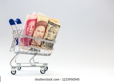 Banknotes Of China, Iran And USA In The Same Supermarket Cart, The Financial Burden Of Each Country Is A Trade Competitor In The Trade War.