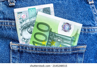 Banknotes of Czech krona and Euro in jeans pocket. Worldwide currencies