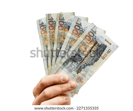 Banknotes from Peru. Peruvian currency. Hand with bill of one hundred Peruvian soles. Peruvian economy.