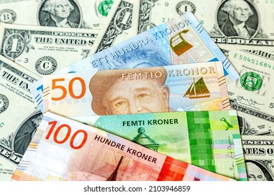 Banknotes of Swedish and Norwegian kronor on the background of American dollars. Business concept