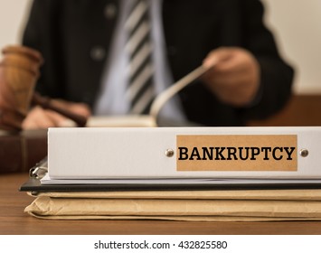 Bankruptcy Document Folder With Lawyer Work At Law Firm.
