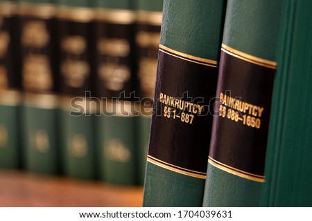 Bankruptcy law books on shelf bookshelf for legal reference