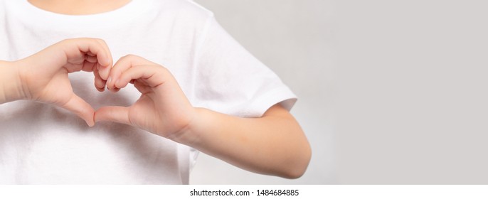 Banner of an adorable little child's hands gesture in heart shape showing love and kindness. Concept of Health care, Charity, Organ Donation, Generous, Pleasure, Hopeful, Love, World heart day. - Shutterstock ID 1484684885