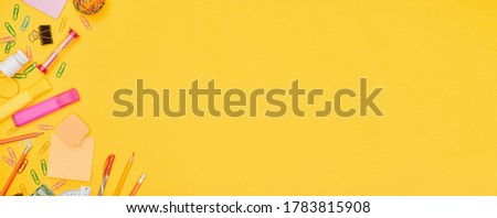Similar – Image, Stock Photo Top view of vibrant dish of raw vegetables with sliced cucumber, halved cherry tomatoes, cauliflower pieces, a lemon slice, and arugula on a cutting board