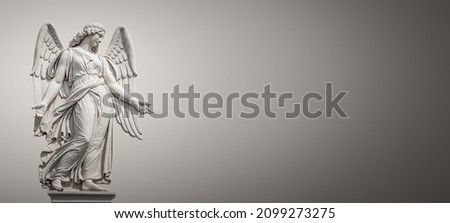 Banner with a beautiful angel as a bas relief wall sculpture, details, closeup, with copy space gradient background. Concept of Religion and Religious Architecture