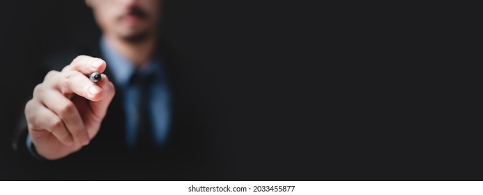 Banner Black Background Of Business Person In Suit With Hand Holding Pen To Point, Professional Business Work Job Successful In Hand Touch Symbol Or Digital Writing For Work Or Education Pointing Idea