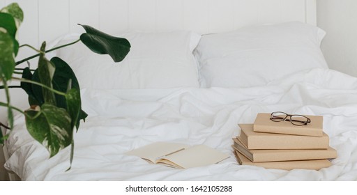 Banner Books On Bed White Bed Linen. Sweet Home Morning Time. Eco Friendly Home Concept