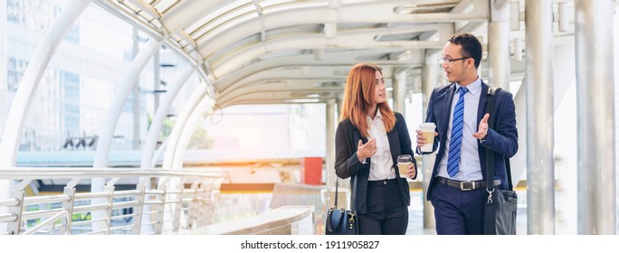 Banner Businessman Businesswoman Drink Coffee In Town Outside Office Modern City. Panoramic Hands Holding Take Away Coffee Cup Talking Together Happy. Copy Space Partner Business People Cup Of Coffee