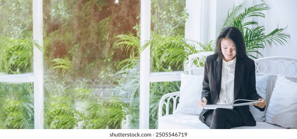 Banner Businesswoman hands writing on notebook meeting agenda in conference room. Banner Woman Hands writing office paper. Female hand holding pencil working Personal Organizer with copy space - Powered by Shutterstock