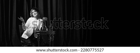 Banner with charming woman wearing vintage costume holding wine glass and smoking. Black and white. Concept of human emotions, beauty, fashion, old films, actress, retro, vintage