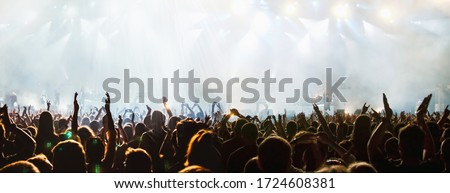 banner of cheering crowd and stage lights with space for your text