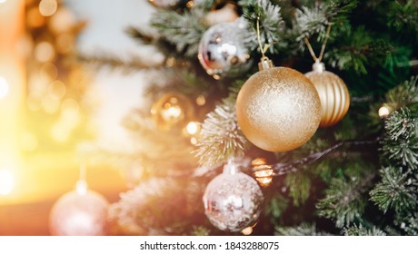 Banner Christmas Tree With Decorations And Illumination, Sun Glare Bokeh In Background.