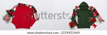 Banner Close up red blank template hoodie copy space. Christmas Holiday concept. Top view mockup hoodie, scarf, hat. Red holidays decorations white background. Happy New Year accessories. Jumper set