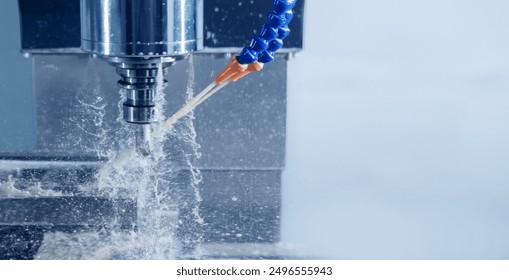 Banner CNC turning cutting metal Industry machine iron tools with splash cutting fluid water. - Powered by Shutterstock