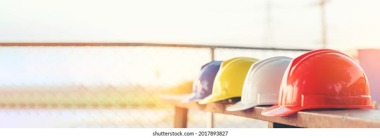 Banner Construction hard hat safety tools equipment for workers in construction site for engineering protection head standard. Panorama Many hard hat helmet on row copy space. Engineer Construction