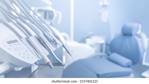 Banner dentists room office. Closeup different dental instruments and tools, blue toning. - Shutterstock ID 2157401121
