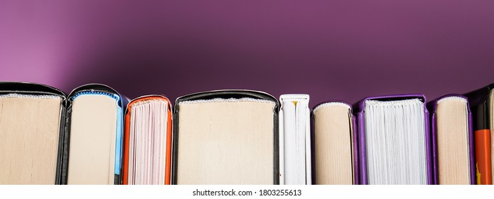 Banner Detail Close Up On Old And Used Hardback Books Or Text Books Seen From Above. Books And Reading Are Essential For Self A New Gaining Knowledge.