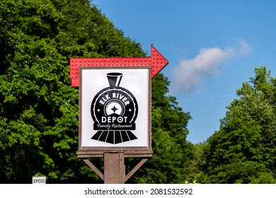 Banner Elk, USA - June 23, 2021: Banner Elk City Small Town Village In North Carolina With Sign Direction To Famous Elk River Depot Family Restaurant