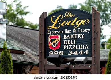 Banner Elk, USA - June 23, 2021: Downtown Banner Elk In North Carolina City Town With Sign For The Lodge Espresso Bar And Eatery Restaurant By Sugar And Beech Mountain Ski Resorts