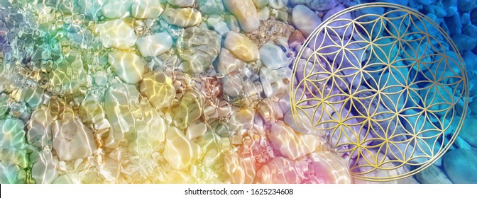Banner flower of life in crystal clear water with rainbow colored waves of light 