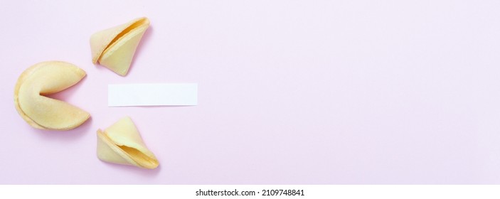 Banner With Fortune Cookie On A Pink Background And Place For Text. Mockup. Blank Paper For Writing A Fortune. Copy Space.