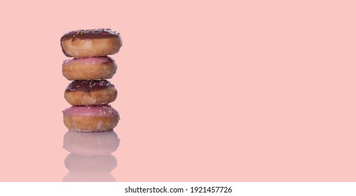 Banner Of  Four Doughnuts On Pink Background