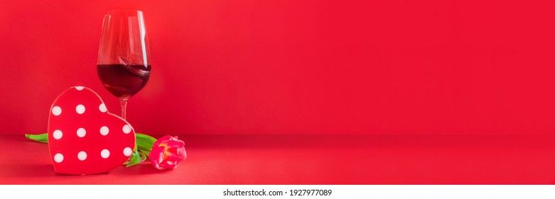 Banner With Glass Of Wine, Heart Shaped Gift Box And Flower On Red Background. Love Romantic Celebration Of Valentine's Day, Womens Day, Mothers Day