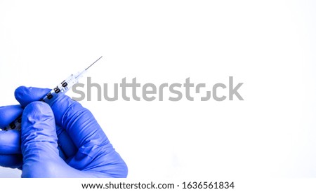 Banner Hand in blue glove holding insulin syringe isolated on white background, Copy space, Medical concept, Injections, vaccine