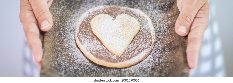 Banner Header Home Made Bakery Cake With Hearth Symbol On It. Concept Of Cooking Cakes With Love