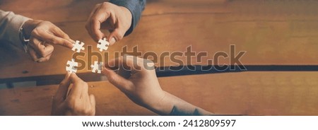 Banner Implement puzzle improve hand holding together solve synergy organize team connection plan trust strategy. Stakeholder business trust teams hands holding jigsaw puzzle synergy with copy space