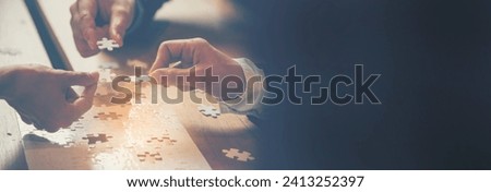 Banner Implement puzzle improve hand holding together solve synergy organize team connection plan trust strategy. Stakeholder business trust teams hands holding jigsaw puzzle synergy with copy space