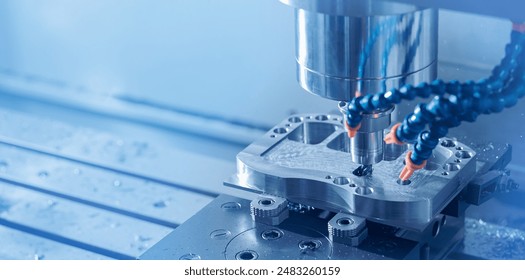 Banner industry CNC, cutting process milling machine working injection mold part by mill tool, blue light toning. - Powered by Shutterstock