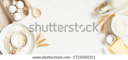 Banner with ingredients for home baking decorated with wheat ears, horizontal copy space composition