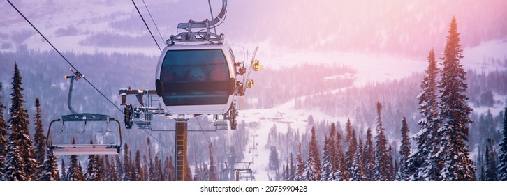 Banner Landscape mountain ski lift resort in winter forest sunset, aerial top view Kemerovo region Russia. - Shutterstock ID 2075990428