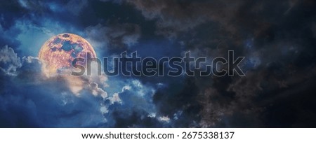 Banner of Lunar eclipse. Bright full moon glowing through dramatic dark clouds in the night sky, creating a mysterious and atmospheric celestial scene.