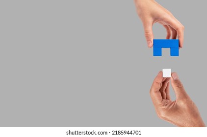 Banner with man and woman hands holding two matching puzzle pieces. Partnership, connection concept. Mutual understanding, support in relations. Copy space. High quality photo