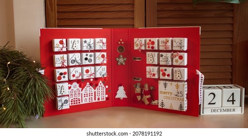 Banner. Original advent calendar made of jewelry boxes and a binder, New Year craft, diy. Magic moment premonition, seasonal activity, Christmas miracle. Soft focus, depth of field - Shutterstock ID 2078191192