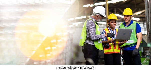 Banner Professional Mechanical Engineer team Working on Personal Computer at Metal lathe industrial manufacturing factory. Engineer Operating  lathe Machinery. Product quality Inspection. panorama - Powered by Shutterstock