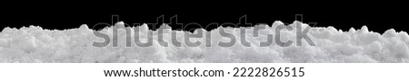 Banner of rough white snow isolated on black